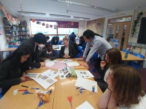 zz with students preparing exhibitiojn